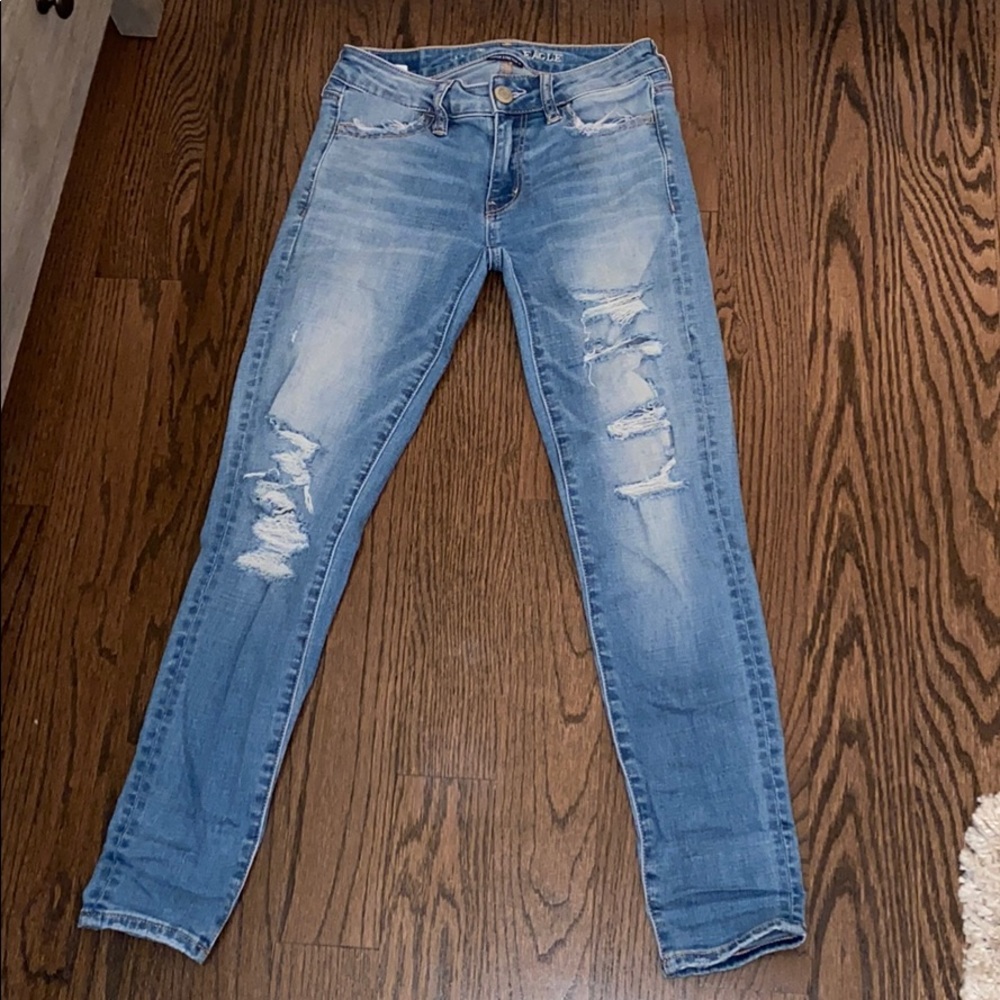 Light blue ripped jeans.